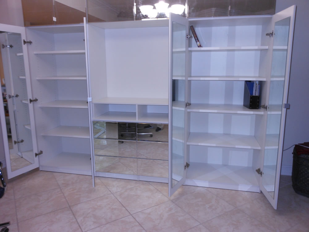 Open Cabinets Reveal Interior Mirrors