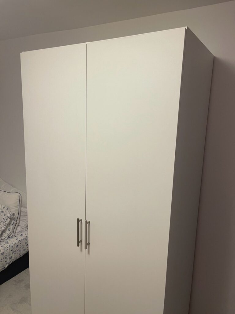 Coordinated Alta Wardrobe Closets in Darian, CT