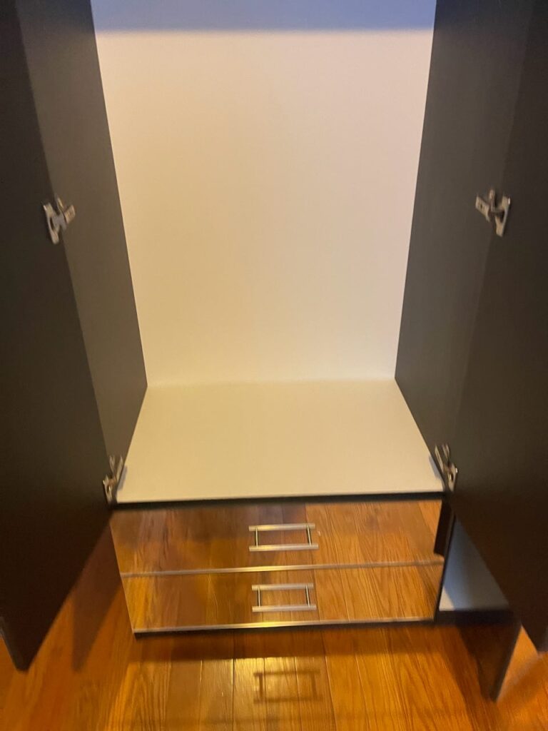 Inside of Mirrored Alta 3-Door Armoire