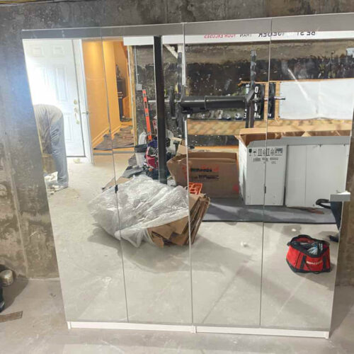 Alta 4-Door Wardrobe for Woodbury NY Basement Multi-Purpose Space