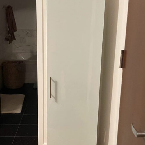 Corner-Fit Narrow Storage Solution for Manhattan Apartment