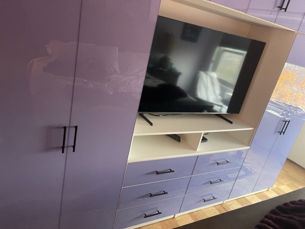 Custom French Lilac Colored Glass TV Armoire in Bronxville, NY