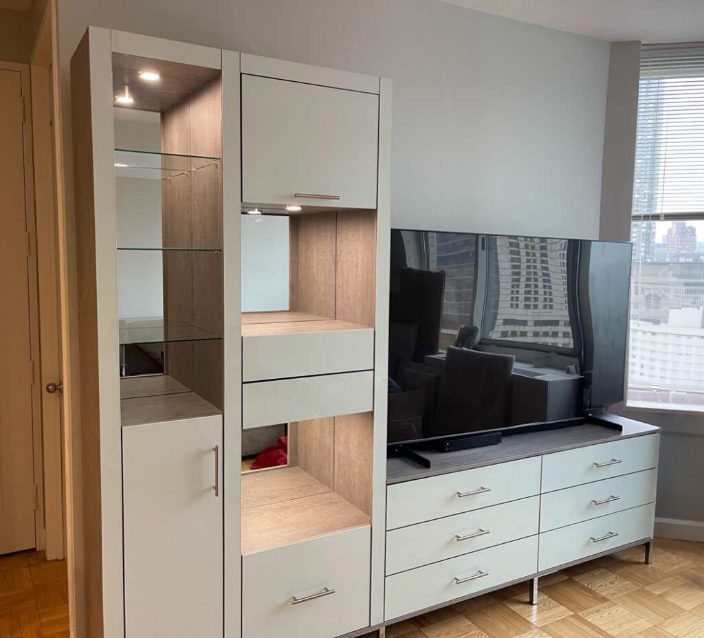 L-shaped entertainment center in Icicle colored glass