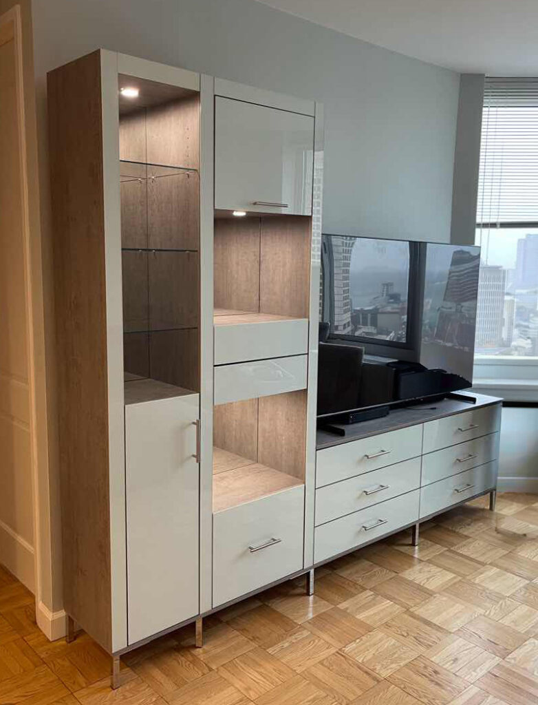 L-shaped entertainment center in Icicle colored glass
