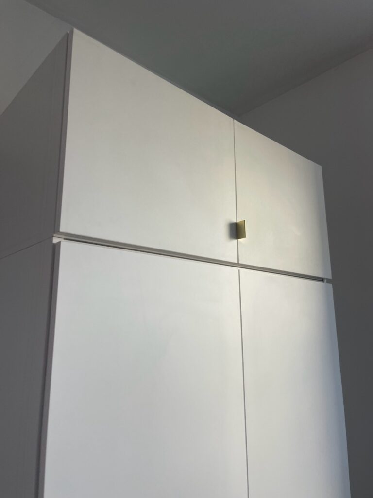 Storage toppers on an Extended-Height Alta Wardrobes
