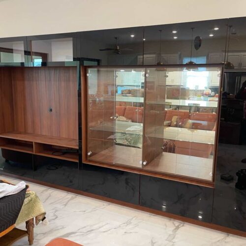 Freestanding Entertainment Center: Custom Black Glass & Albero Matte Design — Bradenton, FL