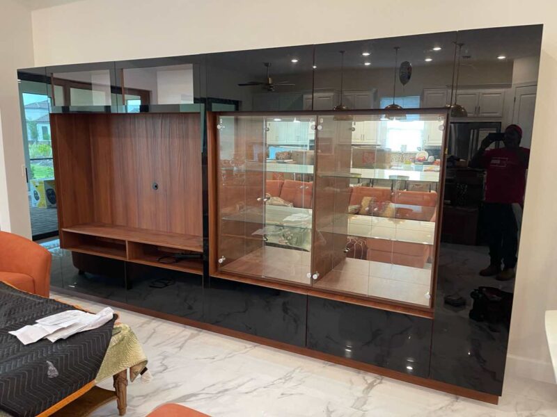 Freestanding Entertainment Center: Custom Black Glass & Albero Matte Design — Bradenton, FL